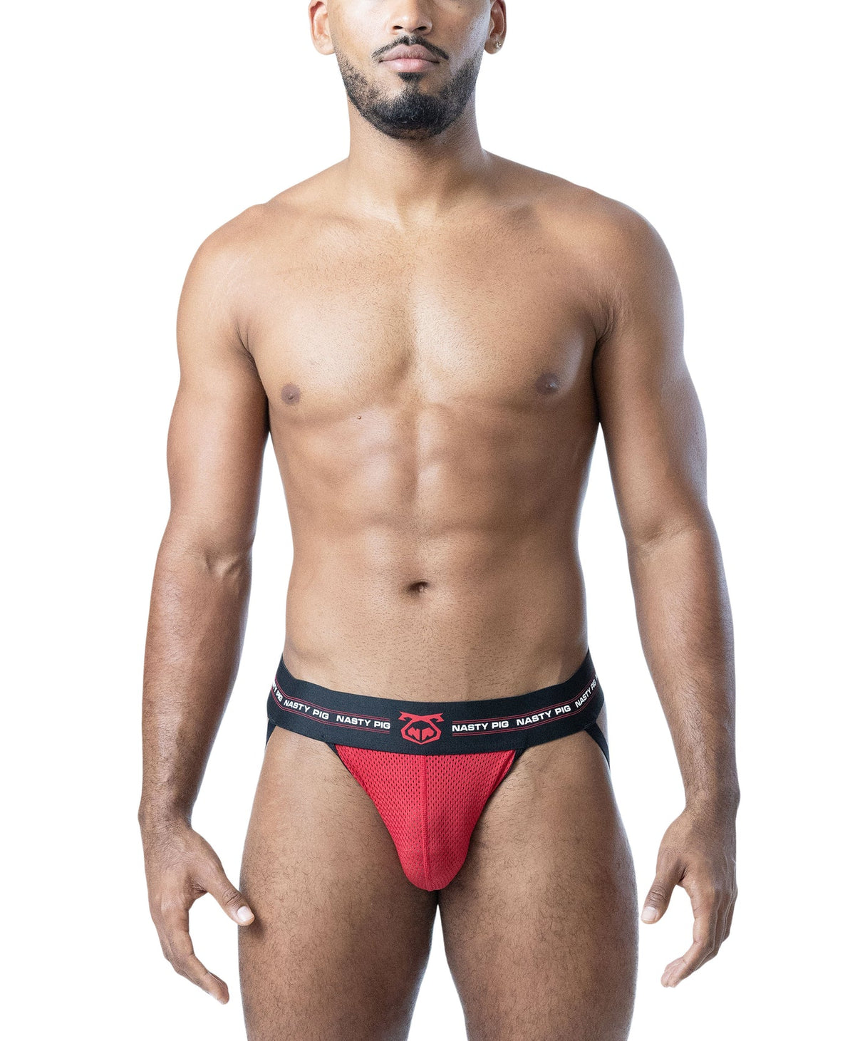A man modeling a red mesh jockstrap with a black waistband featuring white text and a red logo, set against a plain white background.